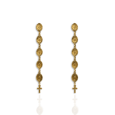 A pair of gold-toned dangle earrings featuring seven circular religious medallions linked by chains, with a small cross hanging from the bottom, shown on a white background with a faint reflection below.