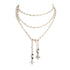Peace Cross Beaded Lariat Cream Pearl - VSA Designs